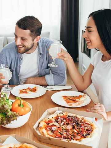 Family at home eating dinner