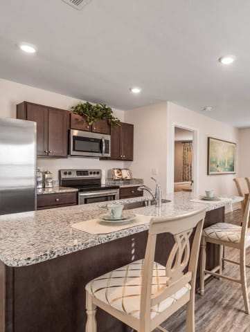 updated kitchen with stainless steel appliances at Emerald Lakes South, Ocean Springs