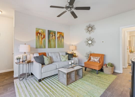 Living Room With Ceiling Fan at Reserve at Bridford, North Carolina, 27407
