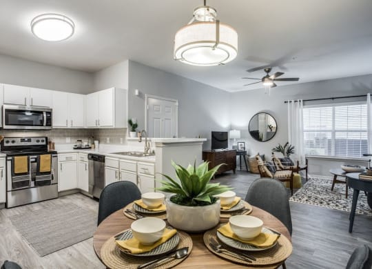 Beautifully appointed interiors with white cabinetry and stainless steel appliances