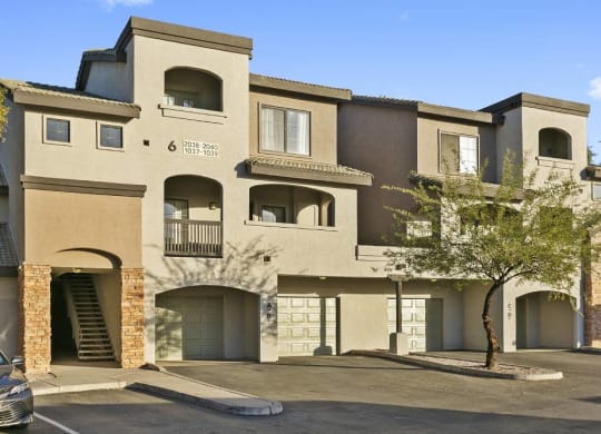 Lazo Apartments Exterior Building with Attached Garages