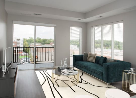 Joel 1 bedroom, living room with floor to ceiling windows and balcony
