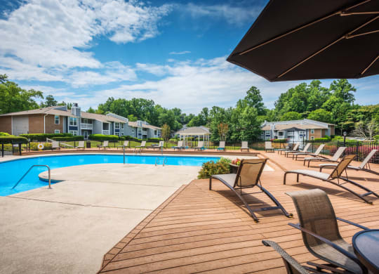 Pool deck and lounge chairs at Arbor Ridge in Greensboro, NC