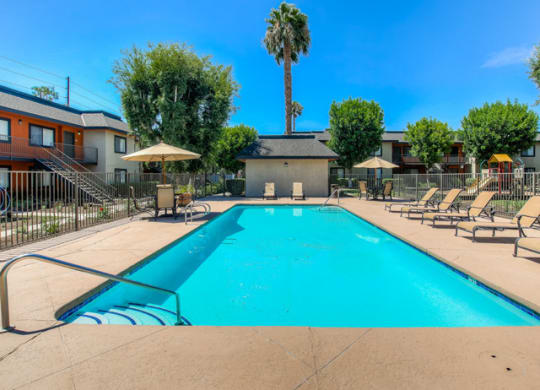 Sparkling Swimming Pool with Lounge Area at Riverwalk Landing Apartment Homes,
