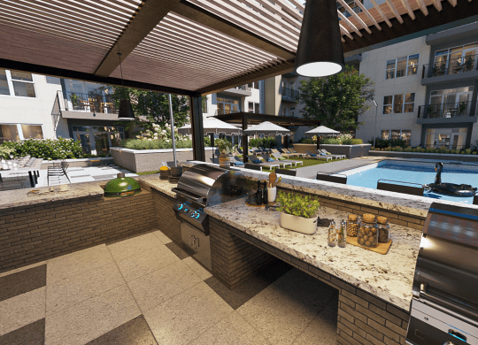 Poolside Sundeck And Grilling Area at Link Apartments® Mint Street, North Carolina