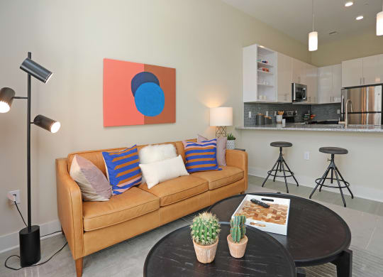 Living Room With Kitchen View at Link Apartments® Innovation Quarter, Winston Salem, North Carolina