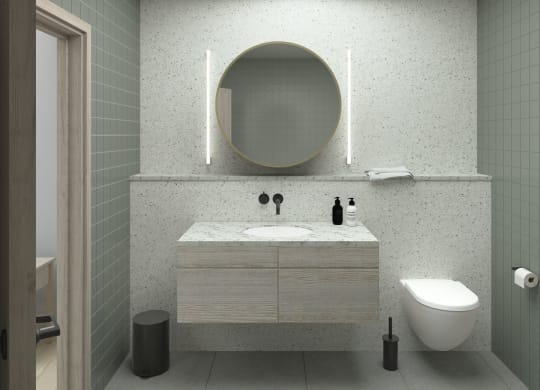 Modern bathroom with backlit mirrors at RiverPoint Apartments in Washington, D.C.