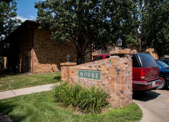 Sign entrance at Moore Place Apartments in Lincoln Nebraska