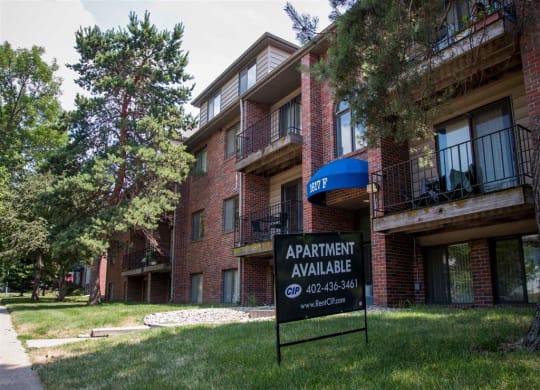 Entrance and sign at Packard House Apartments in Lincoln Nebraska