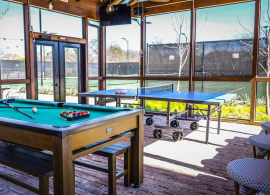 Game room with pool table and ping pong