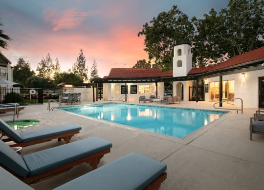Fairfield CA Apartments for Rent-Big Sparkling Pool Surrounded by Comfortable Cushioned Lounge Chairs