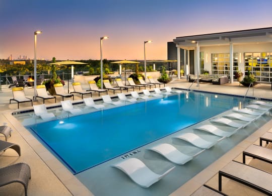 Swimming Pool with Lounge Seating at The Encore by Windsor, Georgia