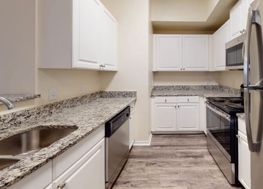 Refrigerator And Kitchen Appliances at The Arbor Walk Apartments, Tampa, FL