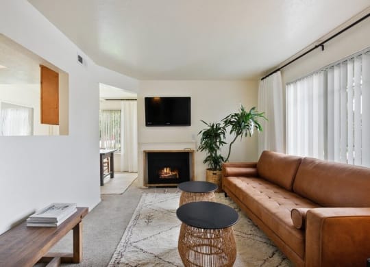 Model living room showcasing fireplace