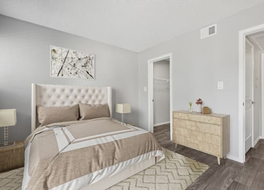 Model bedroom with queen-sized  bed