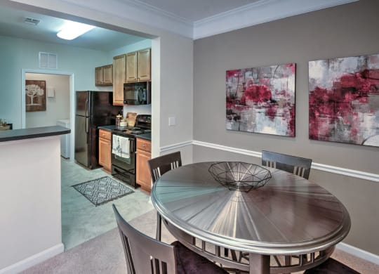 Well-lighted dining areas at Abberly Woods Apartment Homes by HHHunt, Charlotte, NC