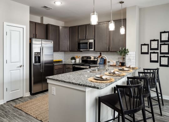 Gourmet Kitchen With Island at Abberly Liberty Crossing Apartment Homes, Charlotte, 28269