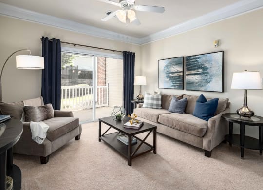 Living Room With Balcony at Abberly Green Apartment Homes, Mooresville, North Carolina
