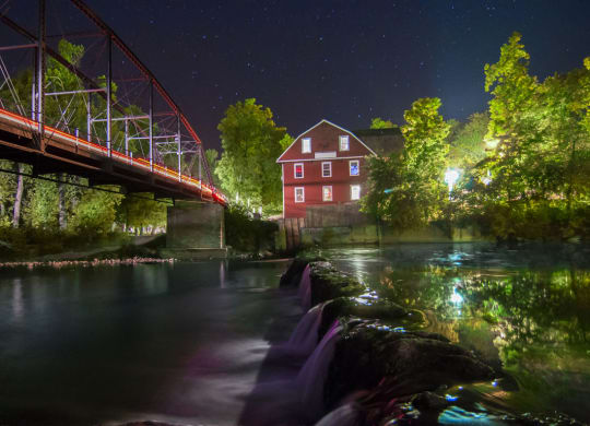 Night View of War Eagle Mill and Bridge in Rogers, AR