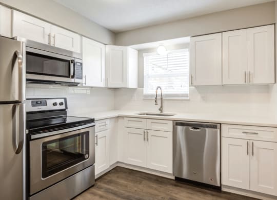 Kitchen with cabinets and stainless steel appliances