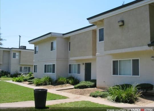 Mutual Housing at River Garden unit exterior, lawn, walkways