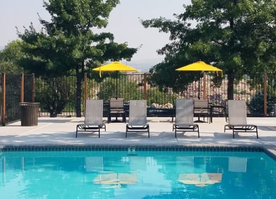 Boulder Creek Outdoor Pool with Lounge Chairs