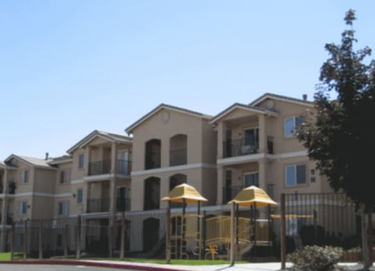 Boulder Creek View of Apartment Exterior and Playground