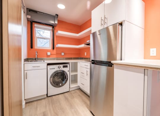 The Mod Life Apartments Kitchen with Washing Machine