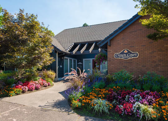 Crown Court Clubhouse Exterior Entry & Floral Landscaping
