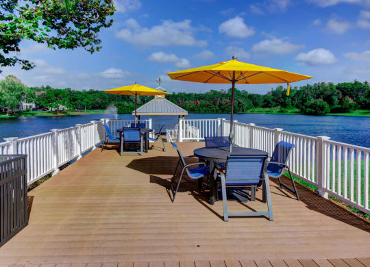Lake with gazebo deck and seating arrangements at Citrus Park, Tampa, FL, 33625