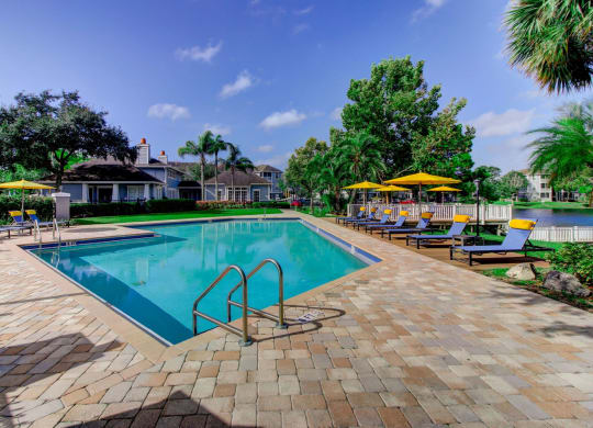 Swimming Pool with Sun Deck and Ample Comfortable Lounging at Berkshires at Citrus Park, Tampa, Florida