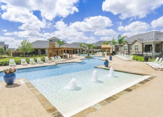 Swimming Pool And Fountain at Villages of Briggs Ranch, San Antonio