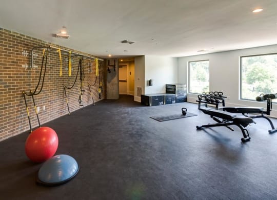 fitness center with free weights at Berkshire Dilworth, Charlotte, North Carolina