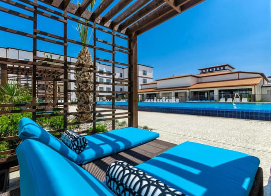 Shaded Lounge Area By Pool at Berkshire Spring Creek, Garland, TX