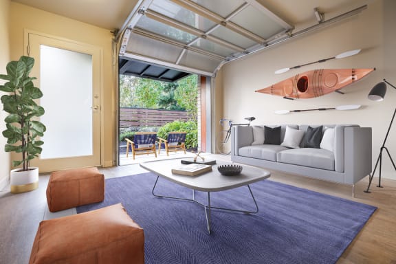 Staged Living room with open garage door