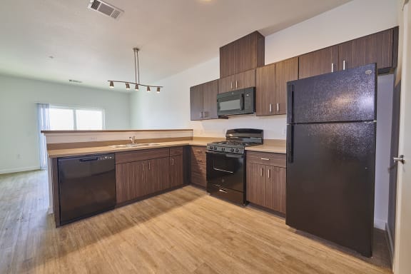 Kitchen with brown cabinets