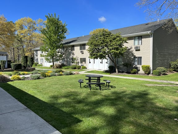 Beautiful green area in front of apartments at Brookwood at Ridge, New York