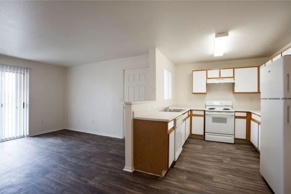 Kitchen & Living Room at Aspen Ridge Apartments in Albuquerque, NM
