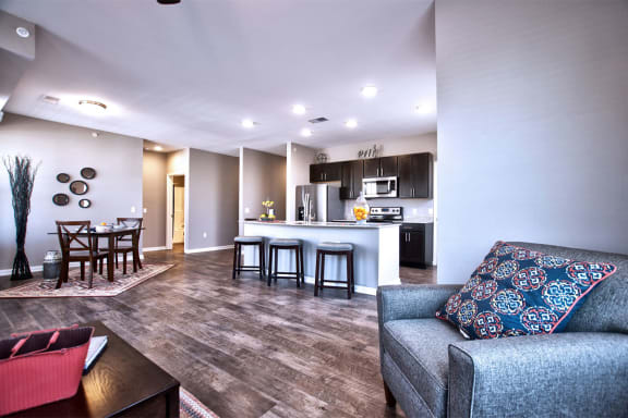 Apartments in Goshen, IN - Spacious Living Room With Modern Hardwood Floors and Open Floor Plan