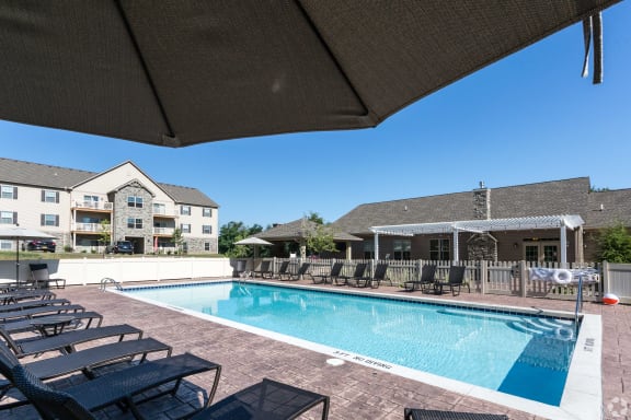 Swimming Pool With Relaxing Sundecks at Copper Creek Apartments, Kent, OH
