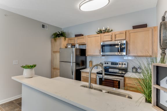 Open kitchen with grey appliances - model 3