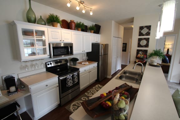 This is a photo of the kitchen in the 2 bedroom Islander floor plan at Nantucket Apartments in Loveland, OH.