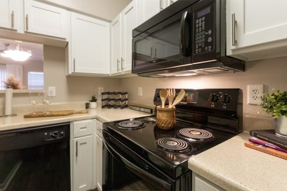 This is a photo of the kitchen in the 1135 square foot 2 bedroom Retreat floor plan at The Sanctuary at Fishers Apartments in Fishers, IN.