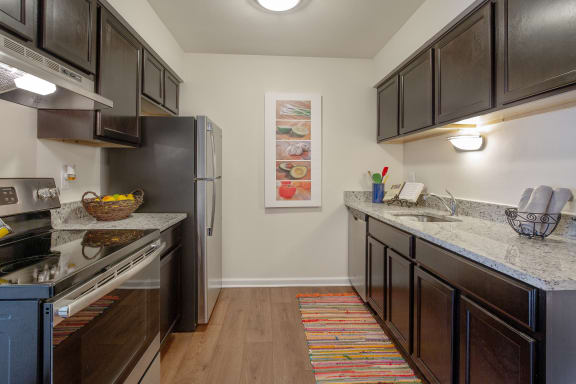 Twilight Kitchen Upgrade with Granite Twilight Kitchen Upgrade with Granite at Lakeside Village Apartments, Clinton Township