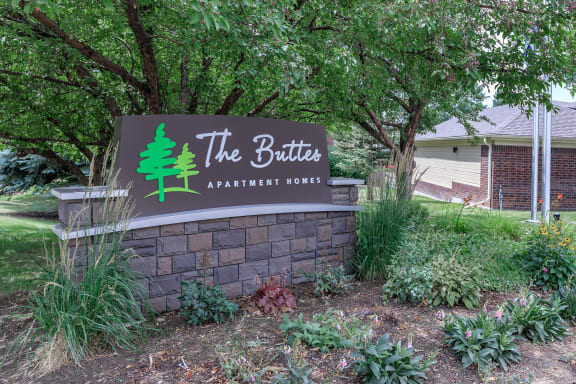 The Buttes Monument Sign