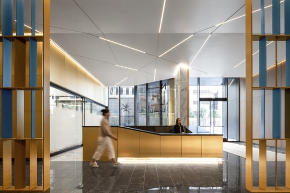 a view of the lobby with a person walking by