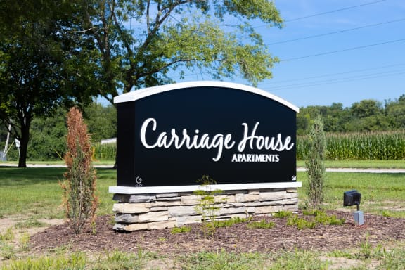 Monument sign at the entrance to Carriage House Apartments Decatur