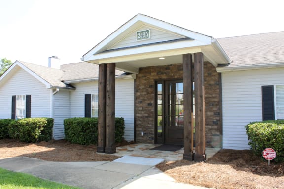 Clubhouse and leasing office entrance at Park at Meadow Ridge Apartments in Montgomery, AL 36117