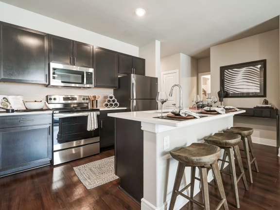 Gourmet Kitchen With Island at AVE Las Colinas, Irving, TX