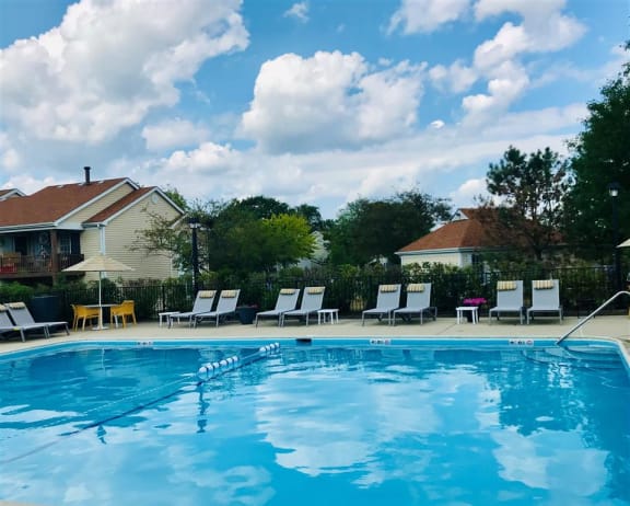 Lounge chairs by pool at The Winds at Poplar Creek, Schaumburg, Illinois